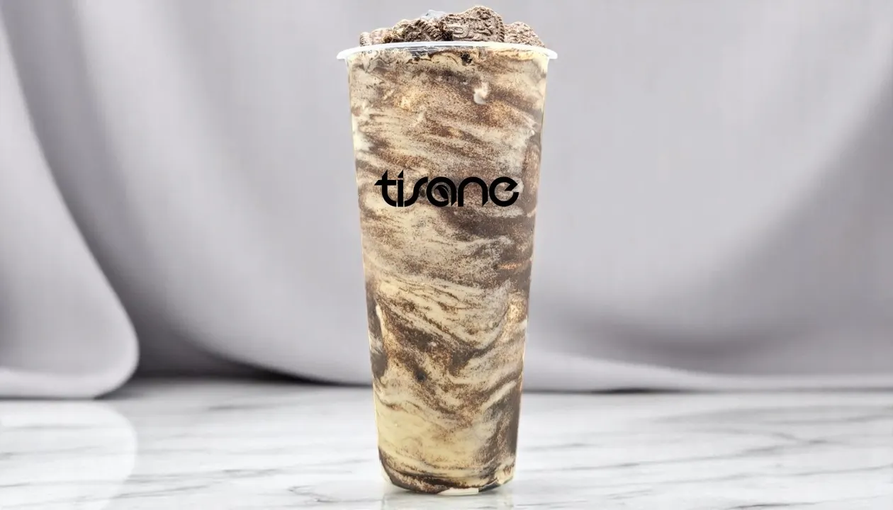 Black Panther jasmine tea with Oreo and crema
